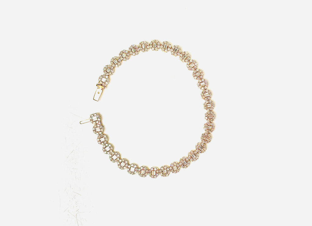 Pearl necklace on a light gray background